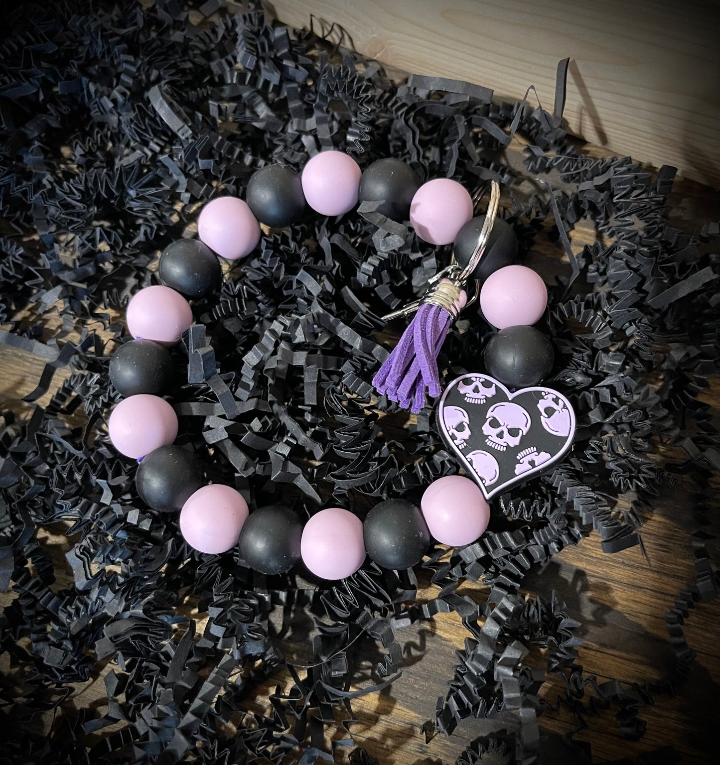 PURPLE SKULLS BEADED KEYCHAIN